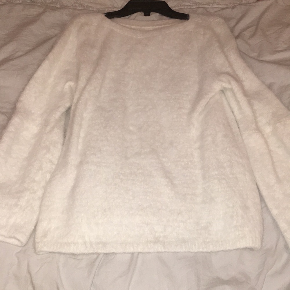 fuzzy white sweater
